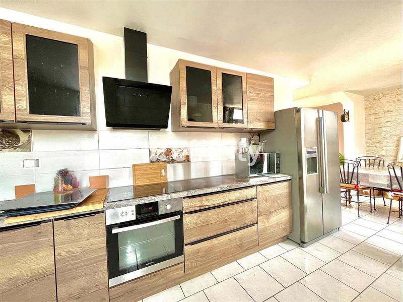 Maison - 100 m² - 5 pièces