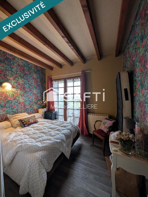 Maison - 216 m² - 9 pièces