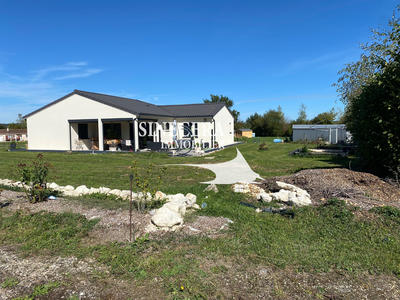 Maison - 104 m² - 4 pièces