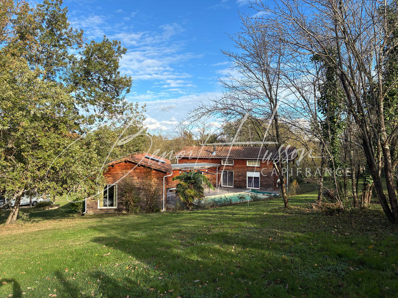 Maison de bois - 176 m² - 6 pièces