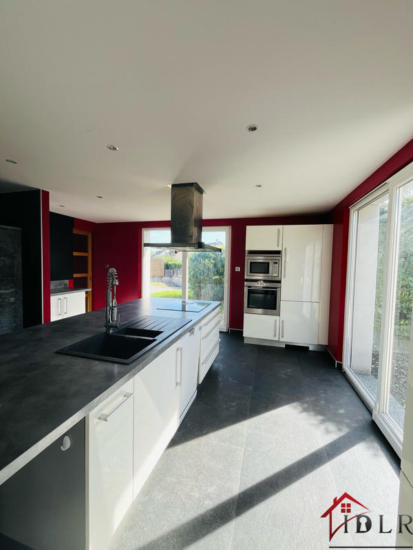 Maison - 240 m² - 7 pièces