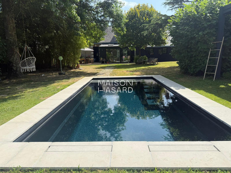 Maison - 219 m² - 8 pièces