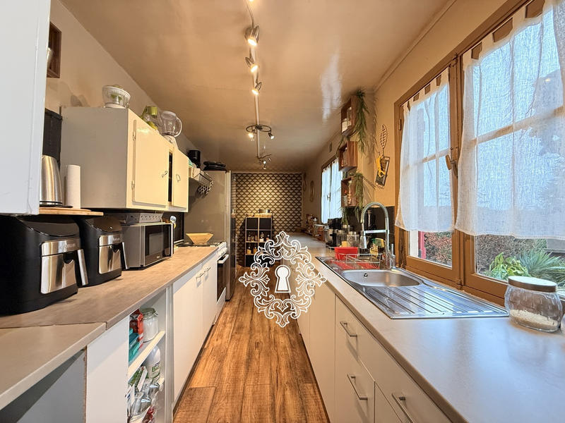 Maison - 95 m² - 5 pièces