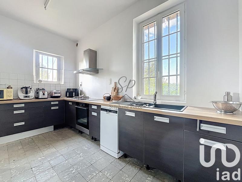 Maison - 415 m² - 15 pièces