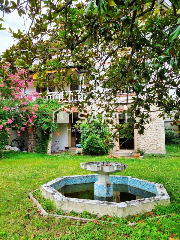 Maison - 200 m² - 7 pièces