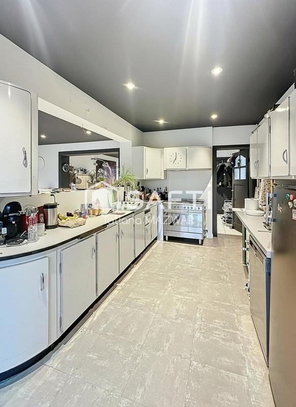 Maison - 170 m² - 8 pièces