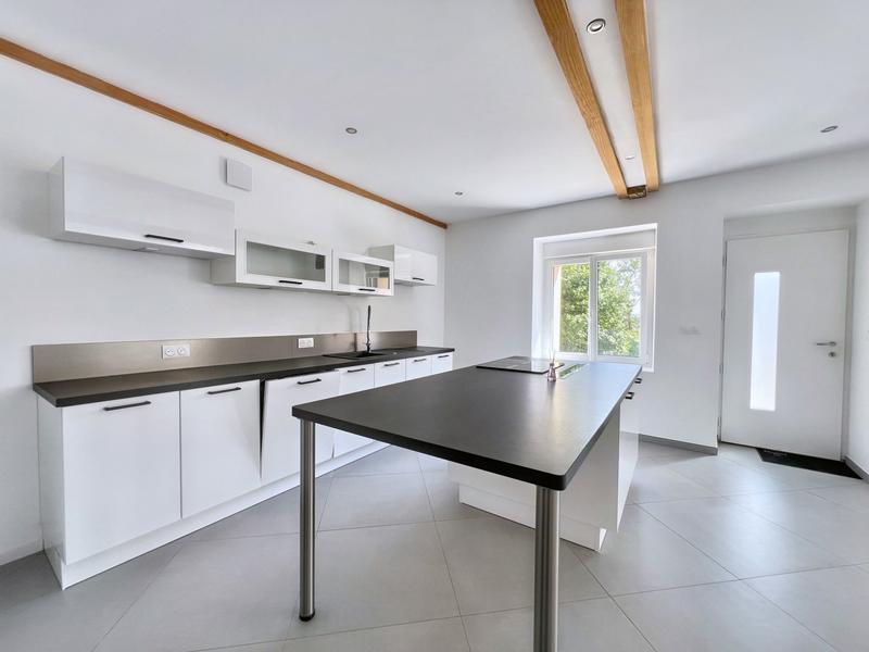 Maison - 95 m² - 5 pièces