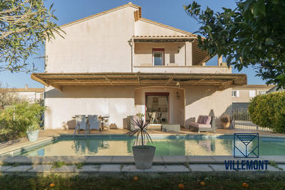 Maison - 210 m² - 9 pièces