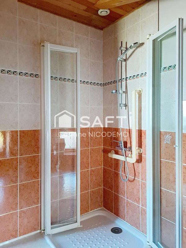 Maison - 219 m² - 9 pièces