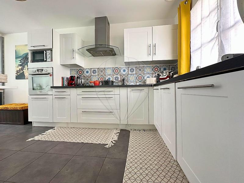 Maison - 105 m² - 4 pièces