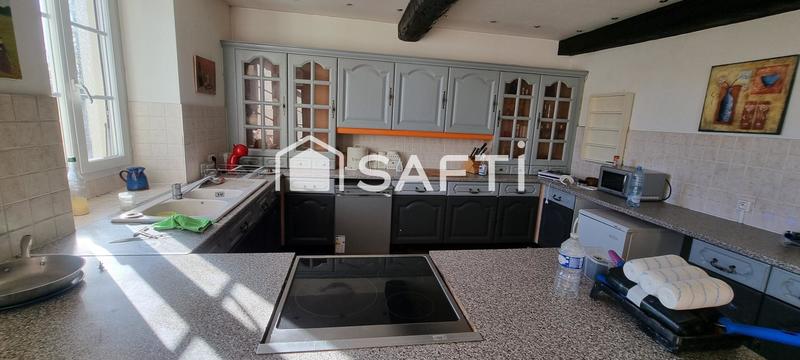 Maison - 240 m² - 7 pièces