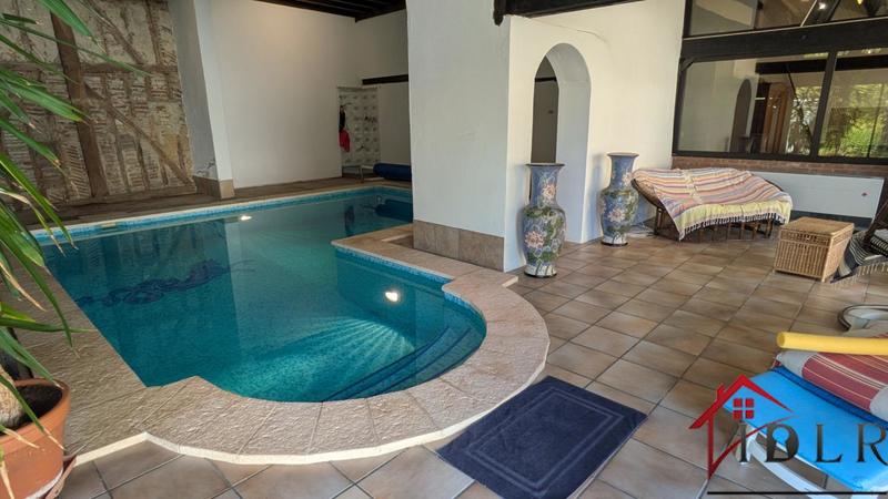 Maison - 200 m² - 7 pièces