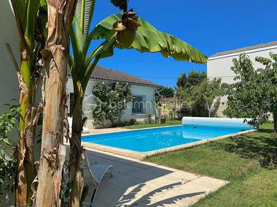 Maison - 215 m² - 8 pièces