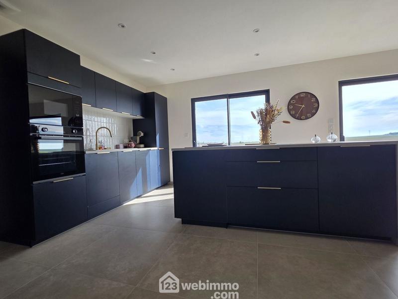 Maison - 95 m² - 4 pièces