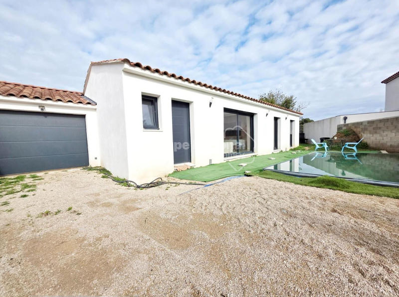 Maison - 95 m² - 5 pièces