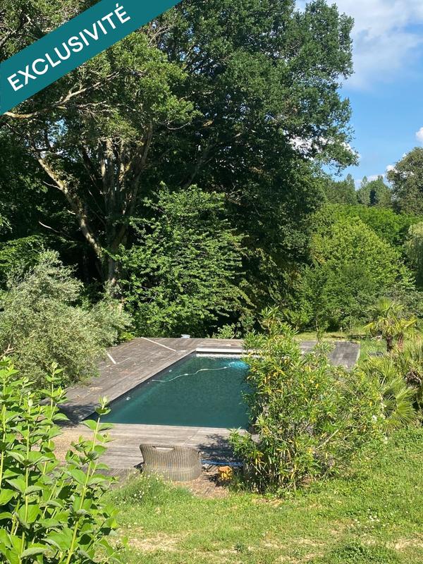 Maison - 325 m² - 8 pièces