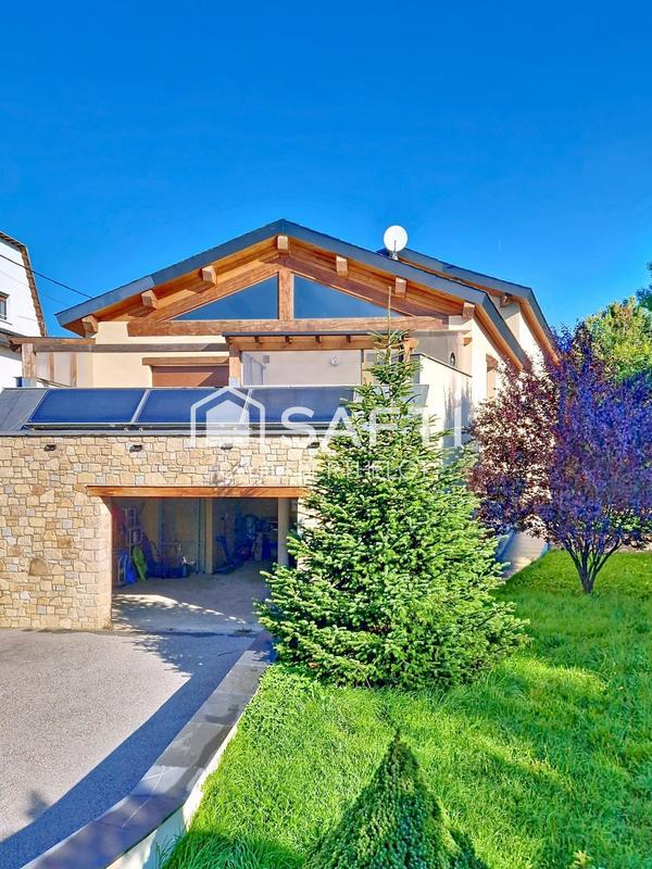 Maison - 219 m² - 9 pièces