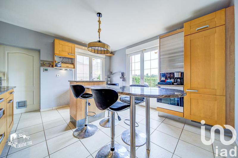 Maison - 219 m² - 9 pièces