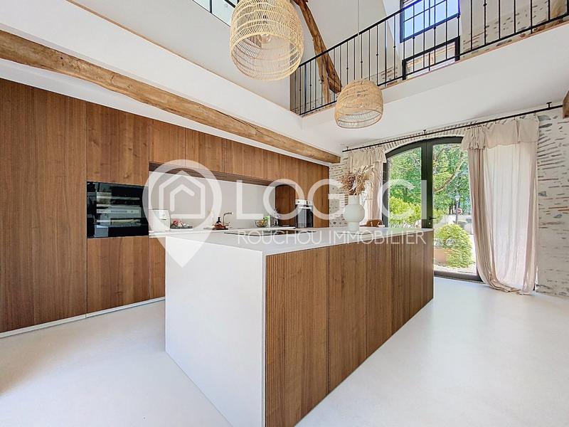 Maison - 240 m² - 7 pièces