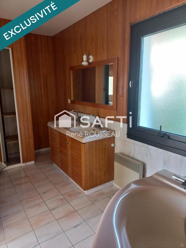 Maison - 95 000 m² - 6 pièces