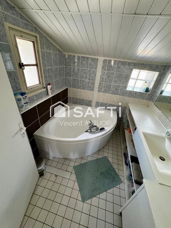 Maison - 185 m² - 7 pièces