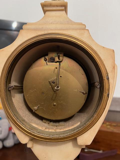 Horloge de cheminée en marbre