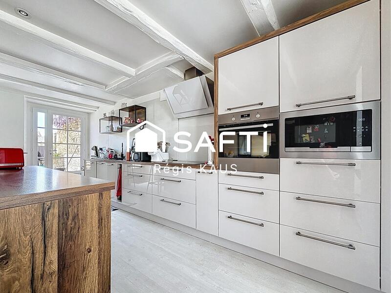 Maison - 210 m² - 7 pièces