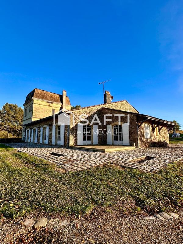 Maison - 430 m² - 12 pièces