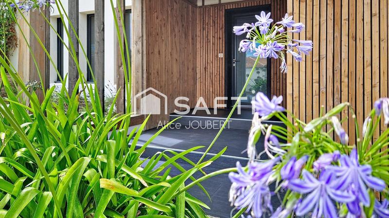 Maison - 210 m² - 8 pièces