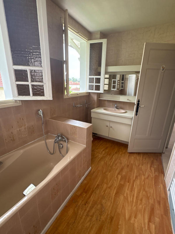 Maison - 200 m² - 7 pièces