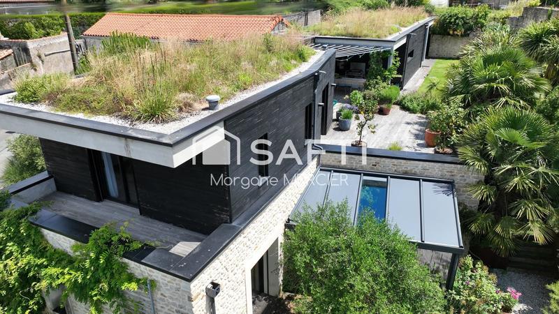 Maison - 220 m² - 8 pièces