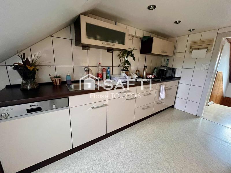 Maison - 215 m² - 12 pièces