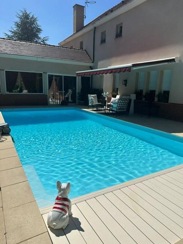 Maison - 242 m² - 7 pièces