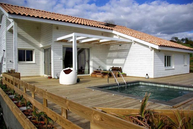 Maison de bois - 143 m² - 5 pièces