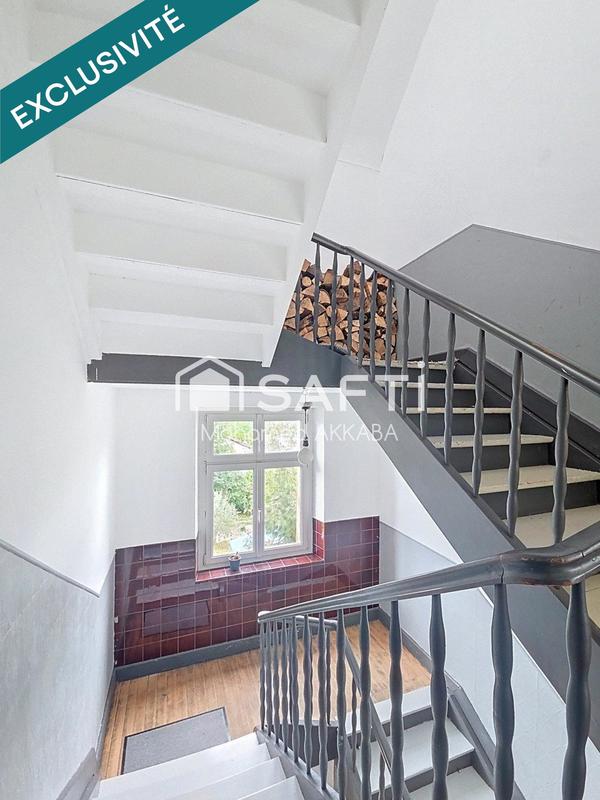 Maison - 310 m² - 12 pièces