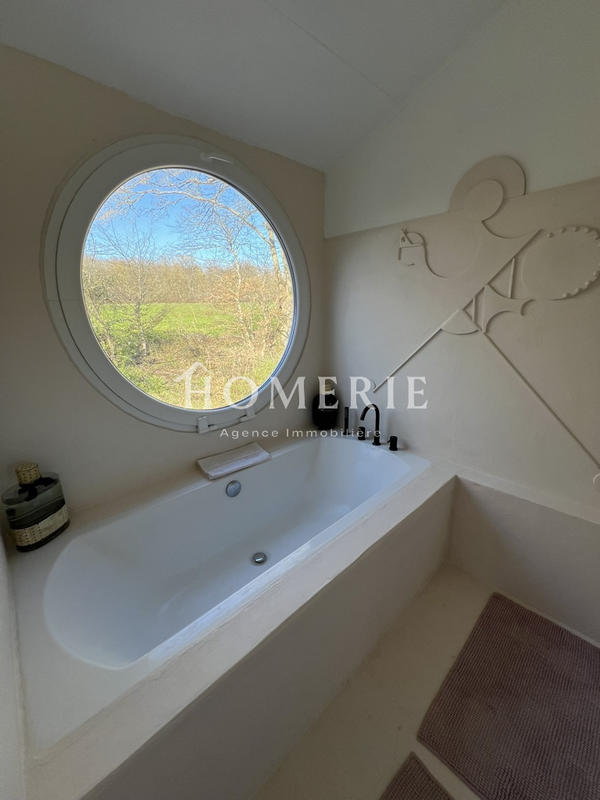 Maison - 215 m² - 7 pièces