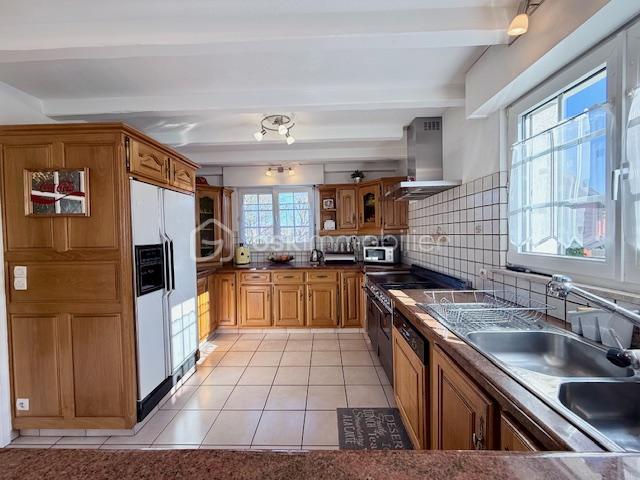 Maison - 113 m² - 5 pièces