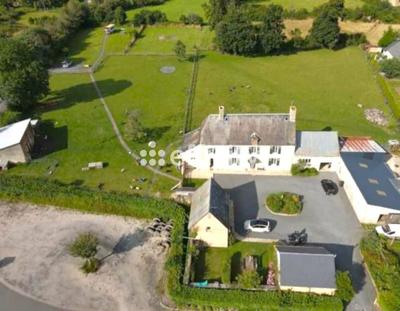 Maison - 210 m² - 7 pièces