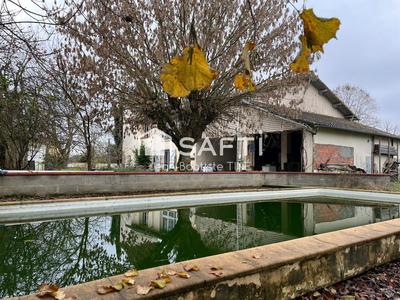 Maison - 303 m² - 7 pièces