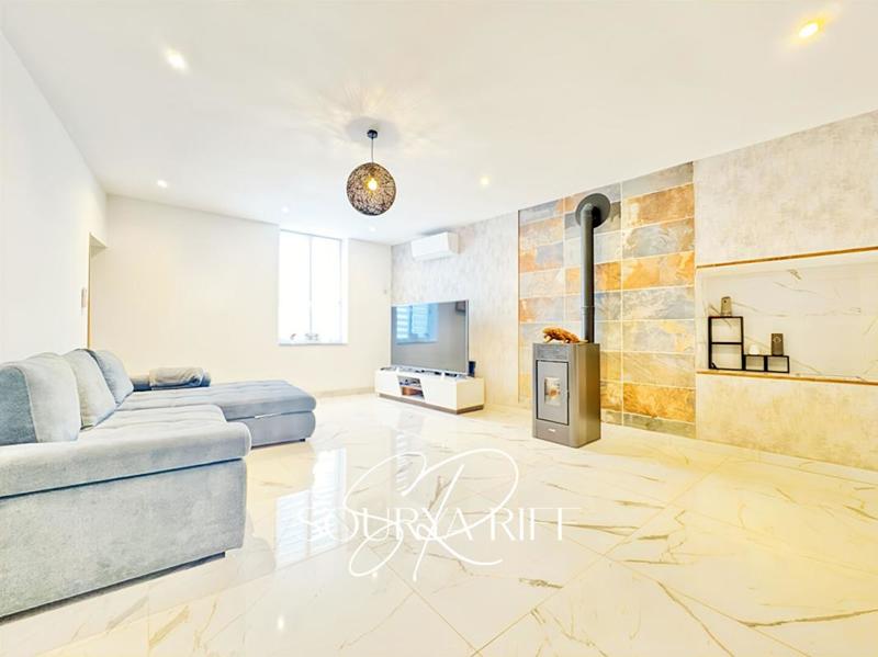 Maison - 200 m² - 7 pièces