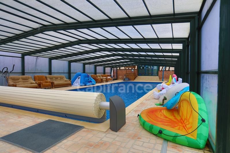 Maison - 424 m² - 14 pièces