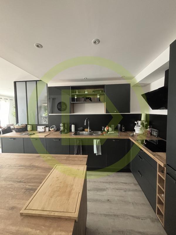 Maison - 200 m² - 7 pièces