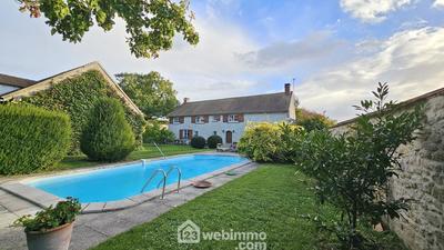 Maison - 200 m² - 7 pièces