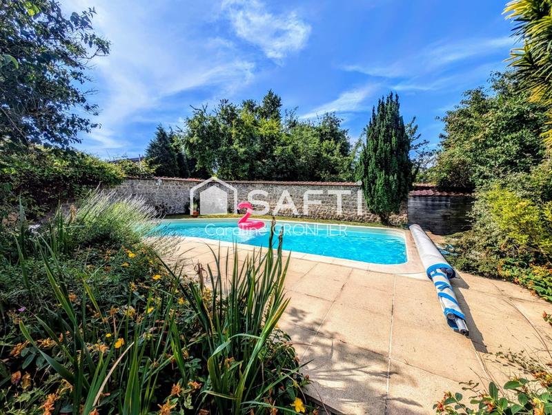 Maison - 208 m² - 10 pièces