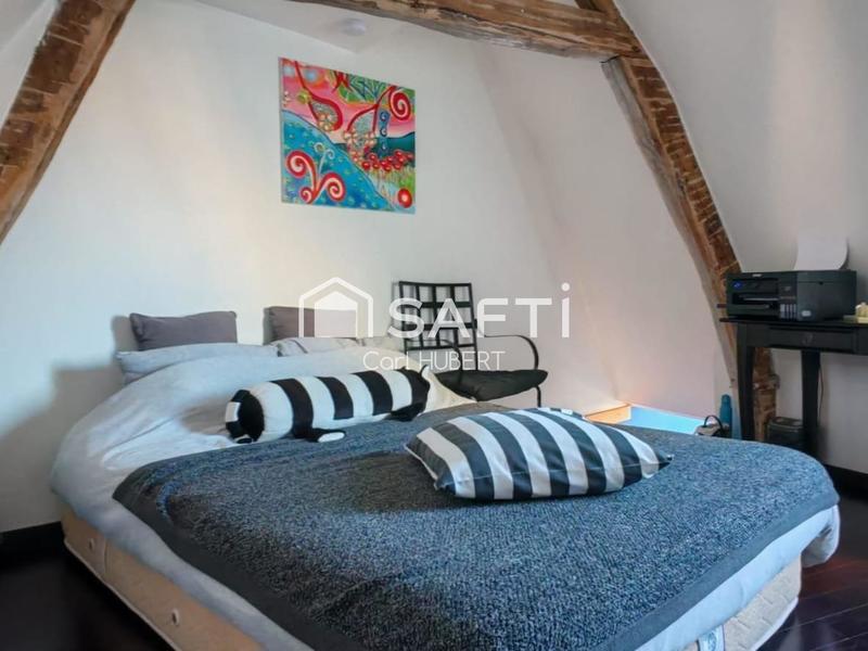 Maison - 303 m² - 16 pièces