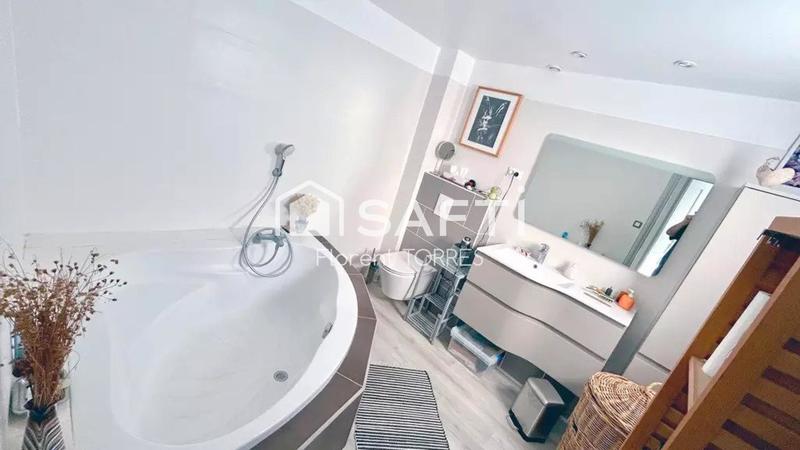 Maison - 95 m² - 5 pièces