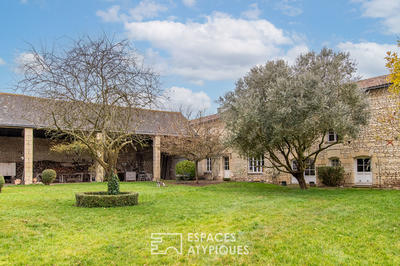 Maison - 460 m² - 12 pièces