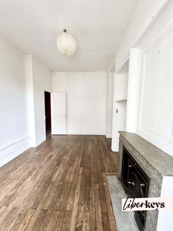 Appartement ancien - 80 m² - 4 pièces