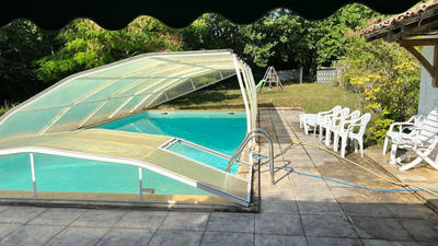 Maison - 240 m² - 7 pièces