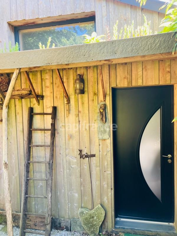 Maison de bois - 140 m² - 9 pièces